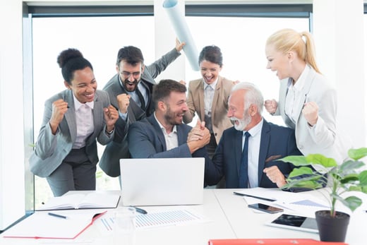 business team celebrating